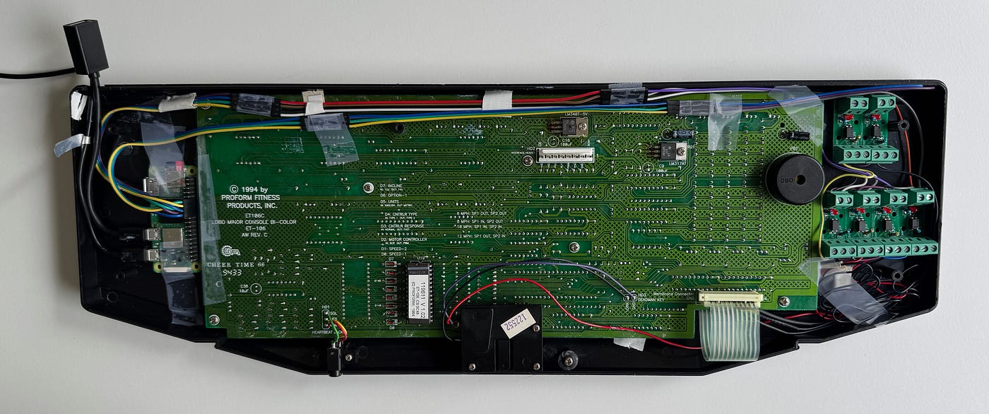 Raspberry Pi Zero 2W on left, 6 optocouplers on right