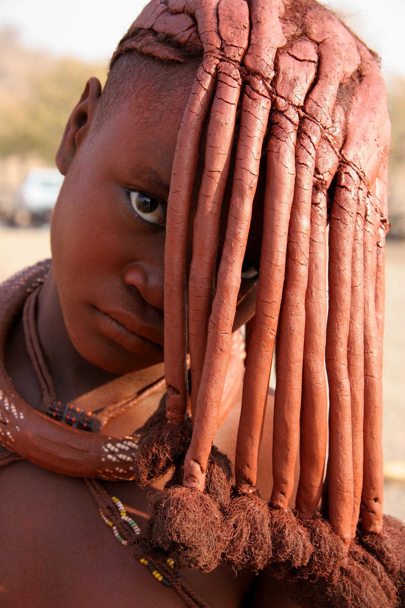 The Unique Hairdo Of Himba Women. Red Ochre — The Color of Earth