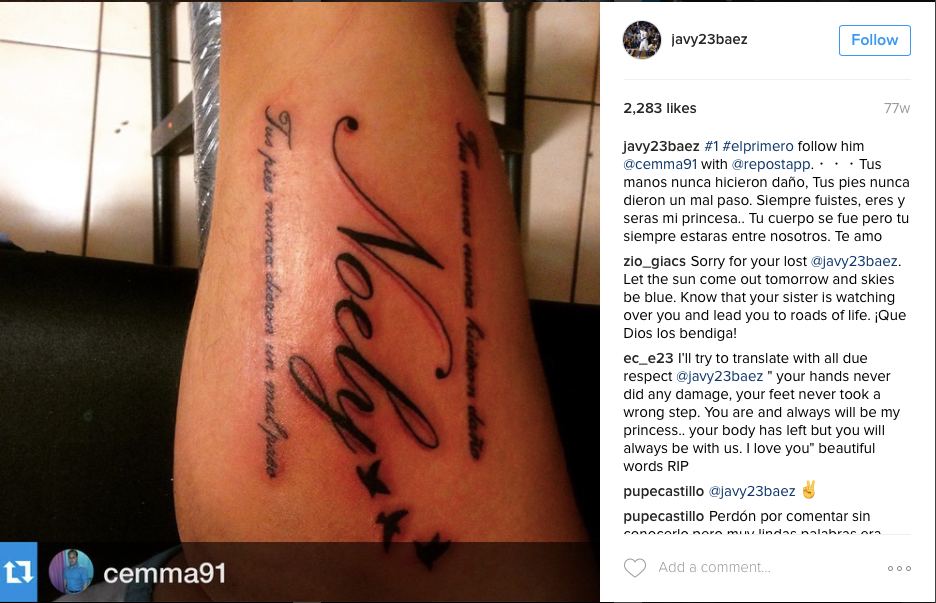 Javy Baez gives himself a tattoo