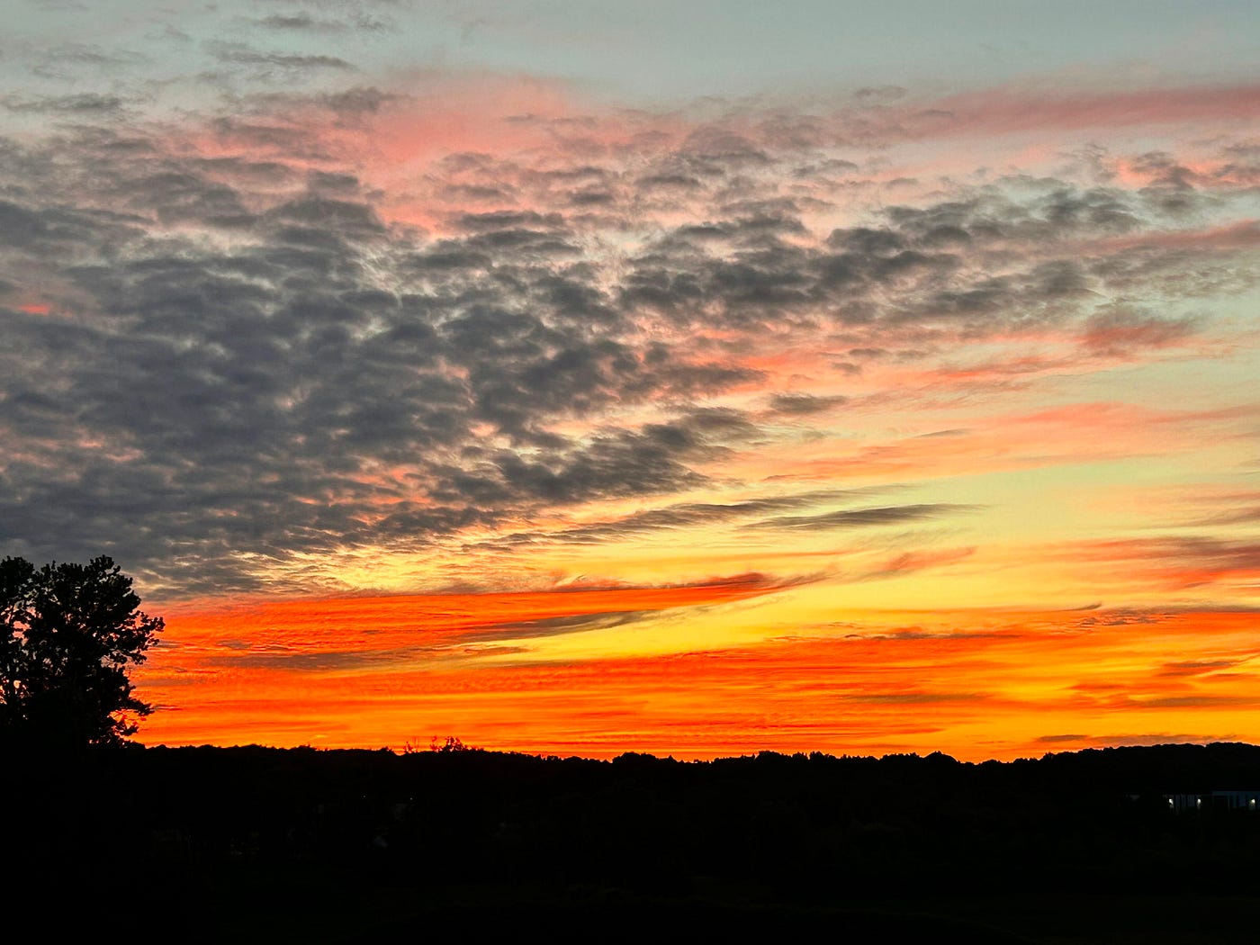 The sky was showing off, so naturally I pulled over. Photo by Author