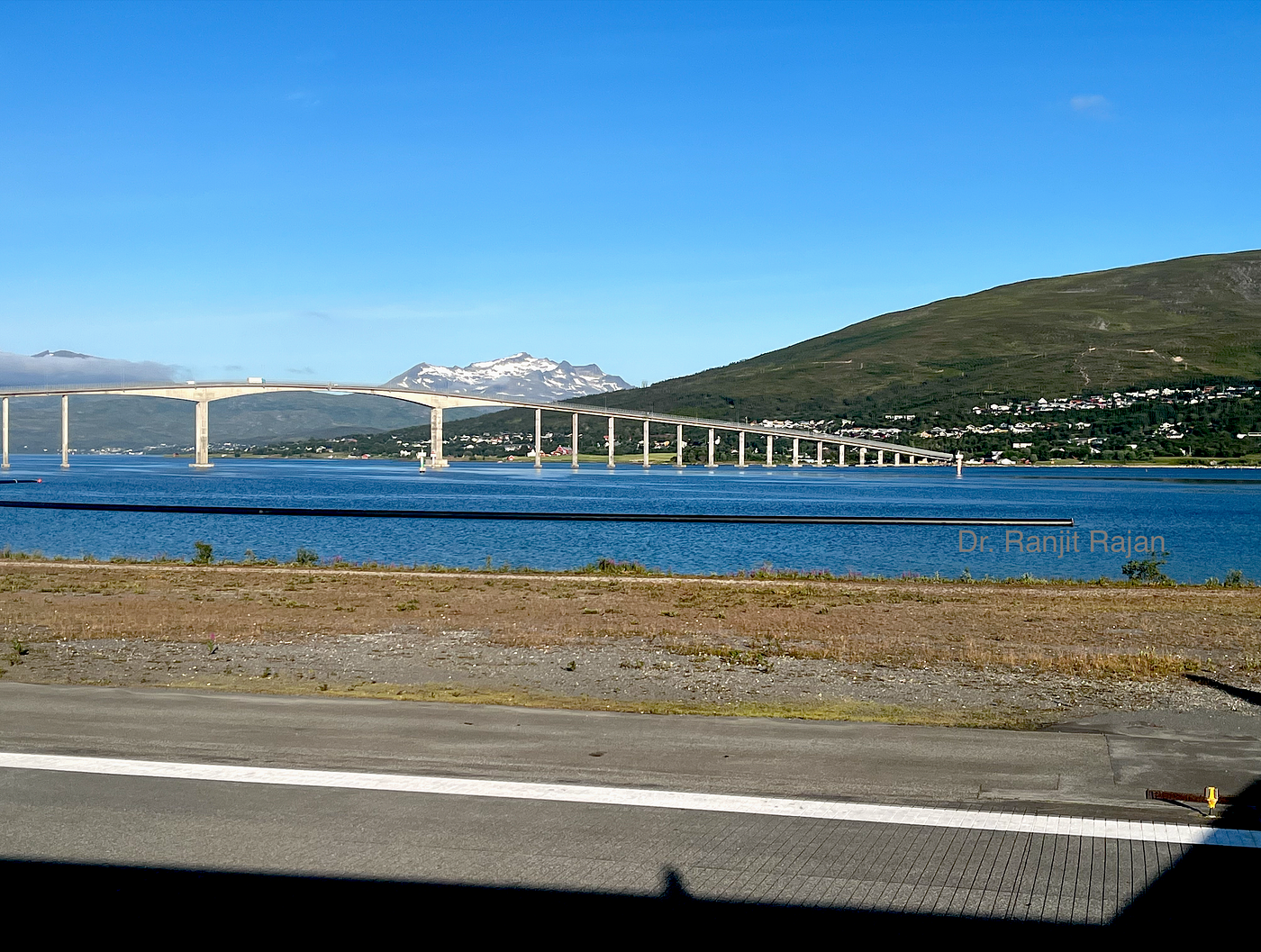Taking off from Tromso airport. Sandnessund Bridge connecting Tromso and an adjacent island, Kvaloya, can be seen