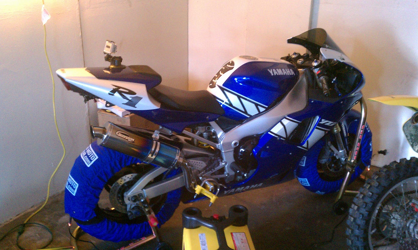 PAINTING A SUPERBIKE ON A SILICON VALLEY BALCONY AND THE SEARCH FOR AN UMBRELLA GIRL