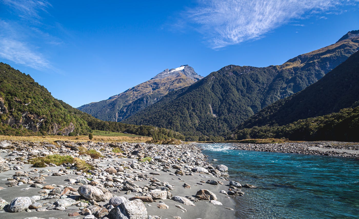 waterfall valley new zealand steep torrent group mountain blue