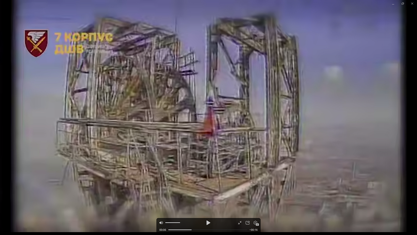 #1 & #2 — Russian flag placed on top the tower. | Video Credit/Source: https://t.me/corps7DSHV/786