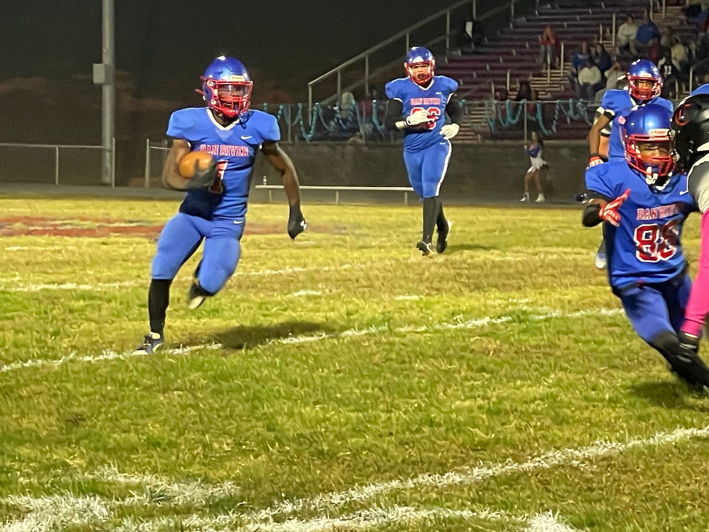 Dan River senior running back DJ Gregory (1) breaks loose for a first down against Dan River Friday evening. PHOTO: Davin Wilson/River City Sports.