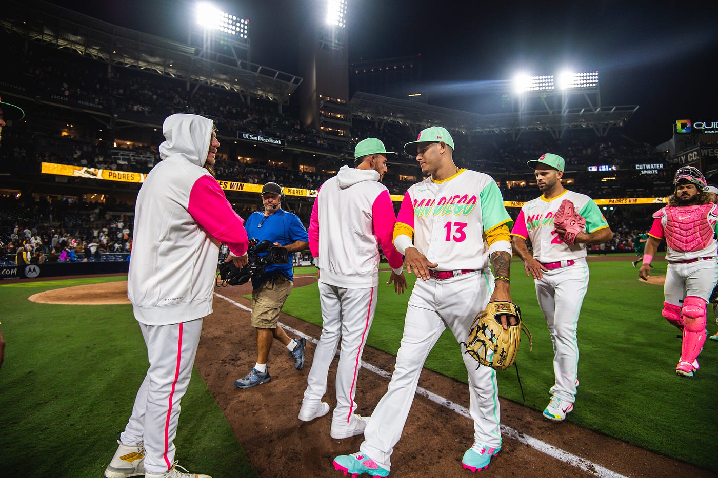 Members of the San Diego Padres wear City Connect uniforms before