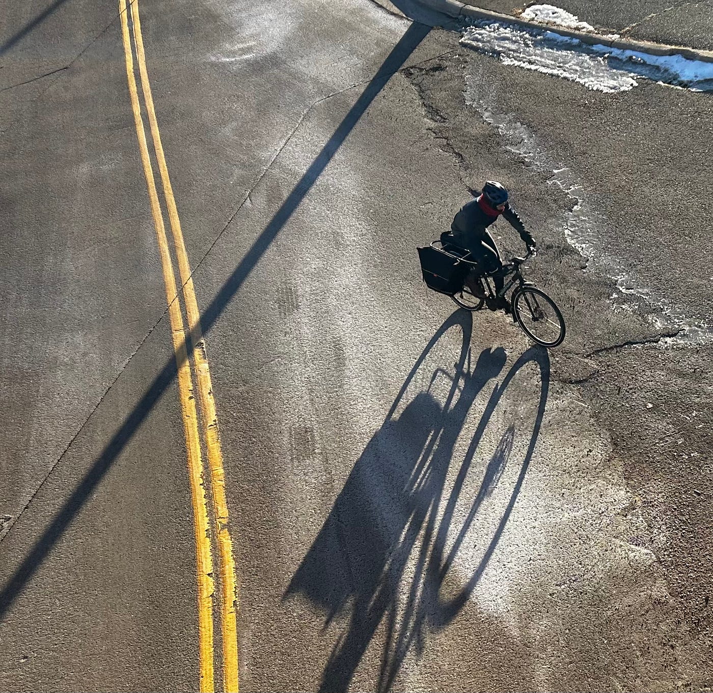 A man biking down by Canal Park Duluth on the cold afternoon of Jan 14. Photo by Jonah Schmieg