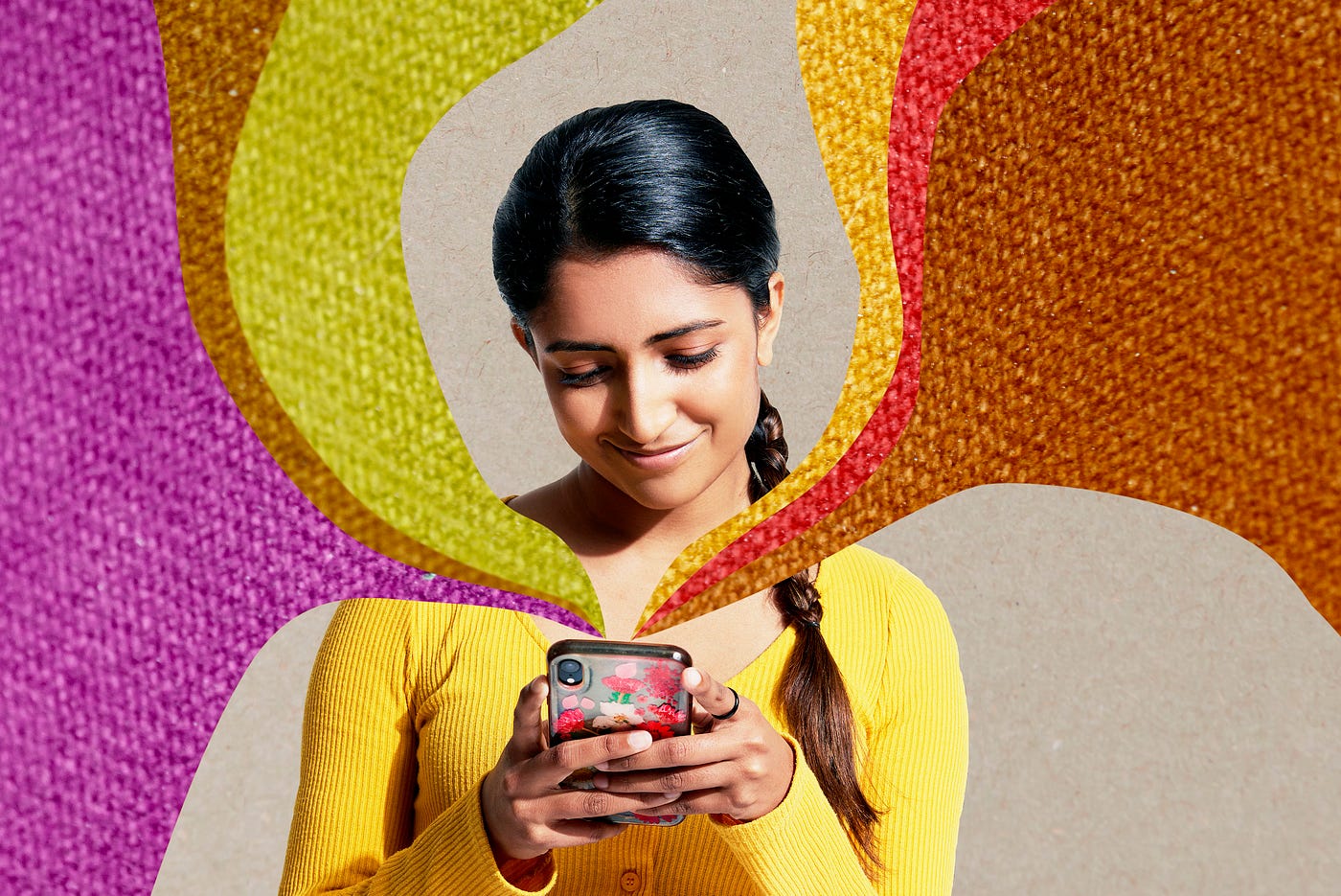 Collage of a South Asian person with their hair in one low side braid typing on a phone. Multicolored swirls of woven fabric texture fly out of the phone.