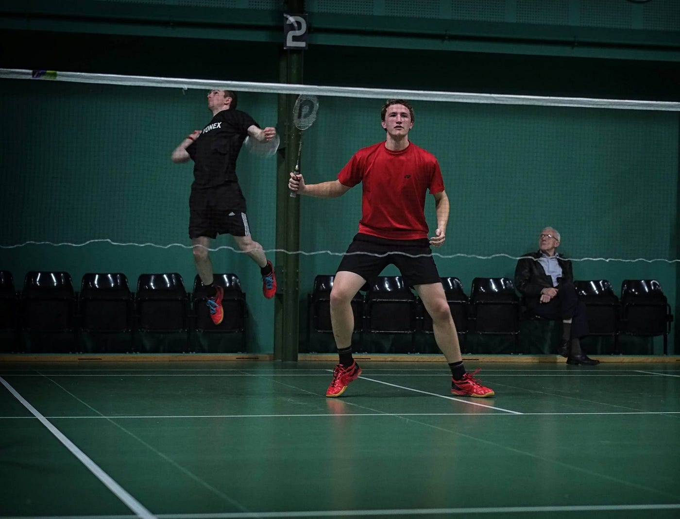 Josh, at a badminton doubles tournament in the UK. Image credit: Josh Males