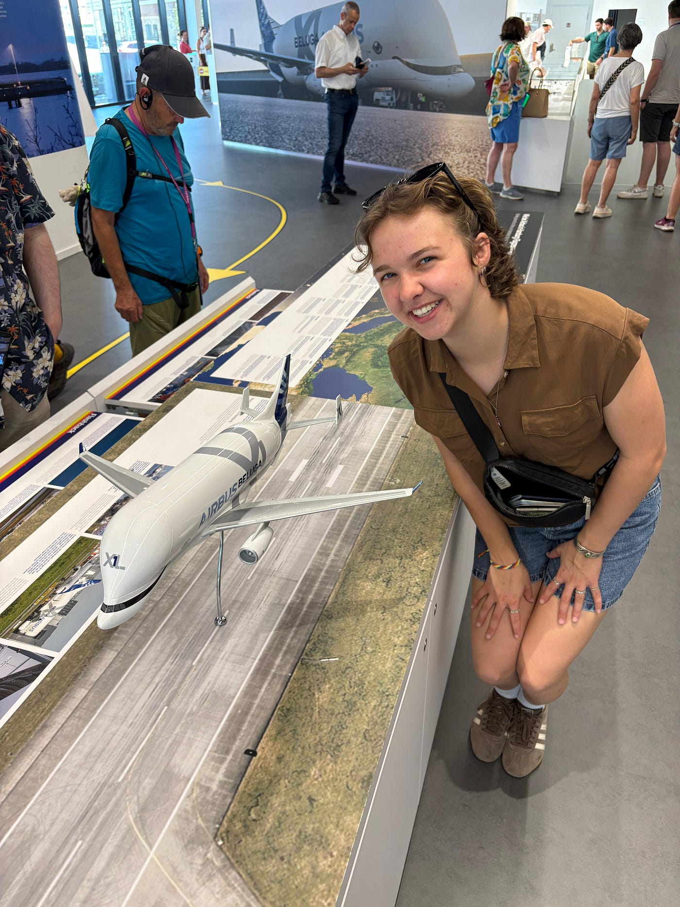 Posing with a model of the Beluga plane.