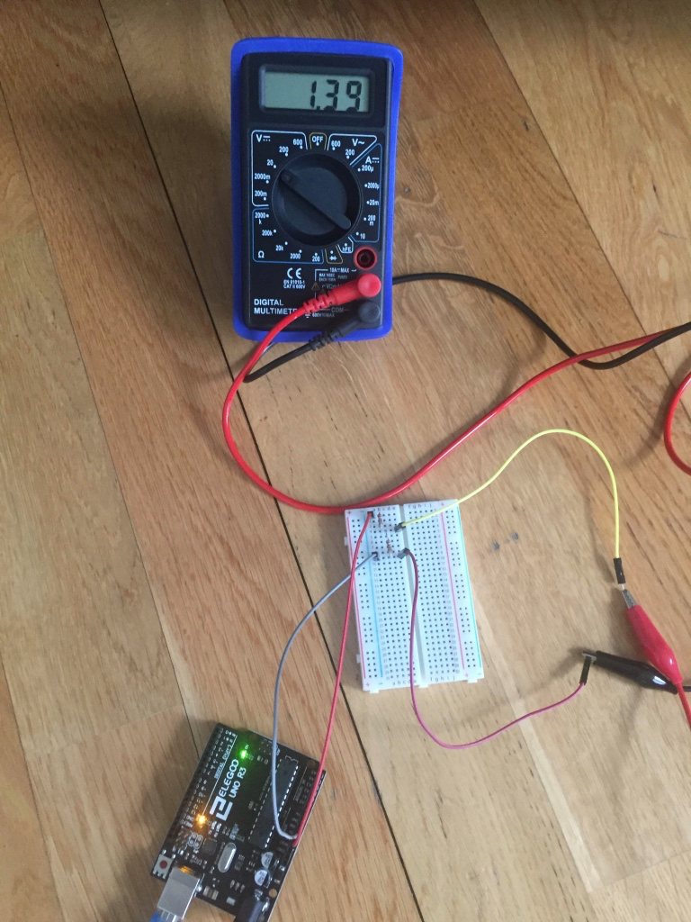 Multimeter reading 1.363V across the voltage divider output