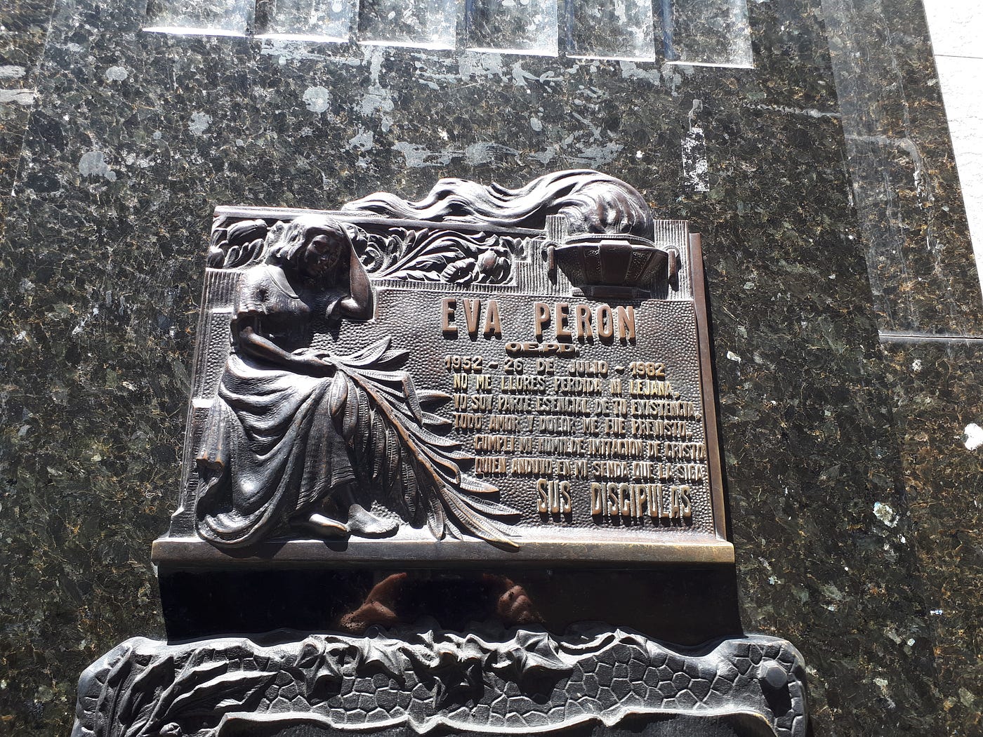 One of the plaques on the mausoleum. Photo by author.
