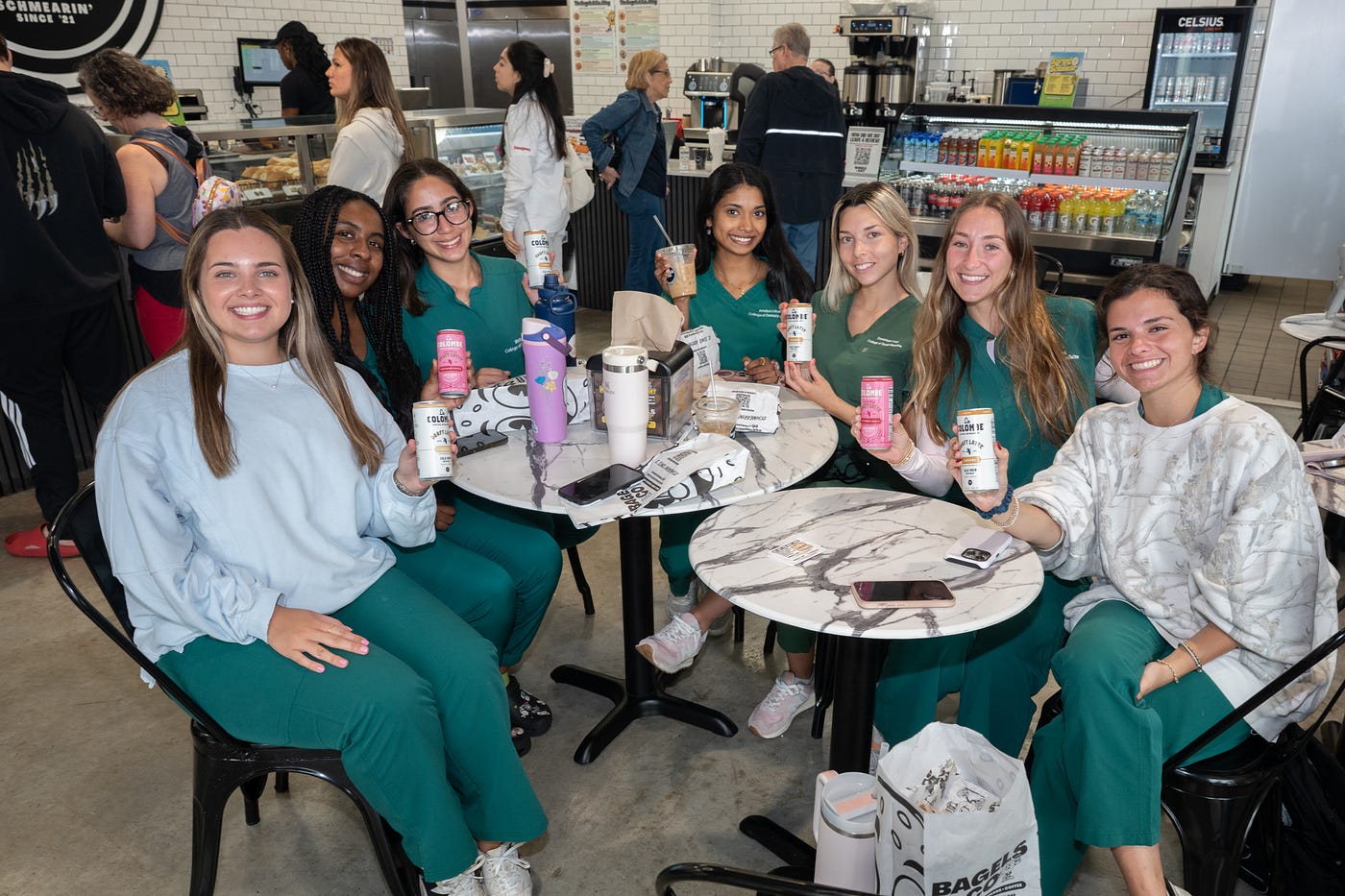 Nova Southeastern University dental students attend the Bagels & Co. grand opening in Davie. (Credit: Michael Murphy)