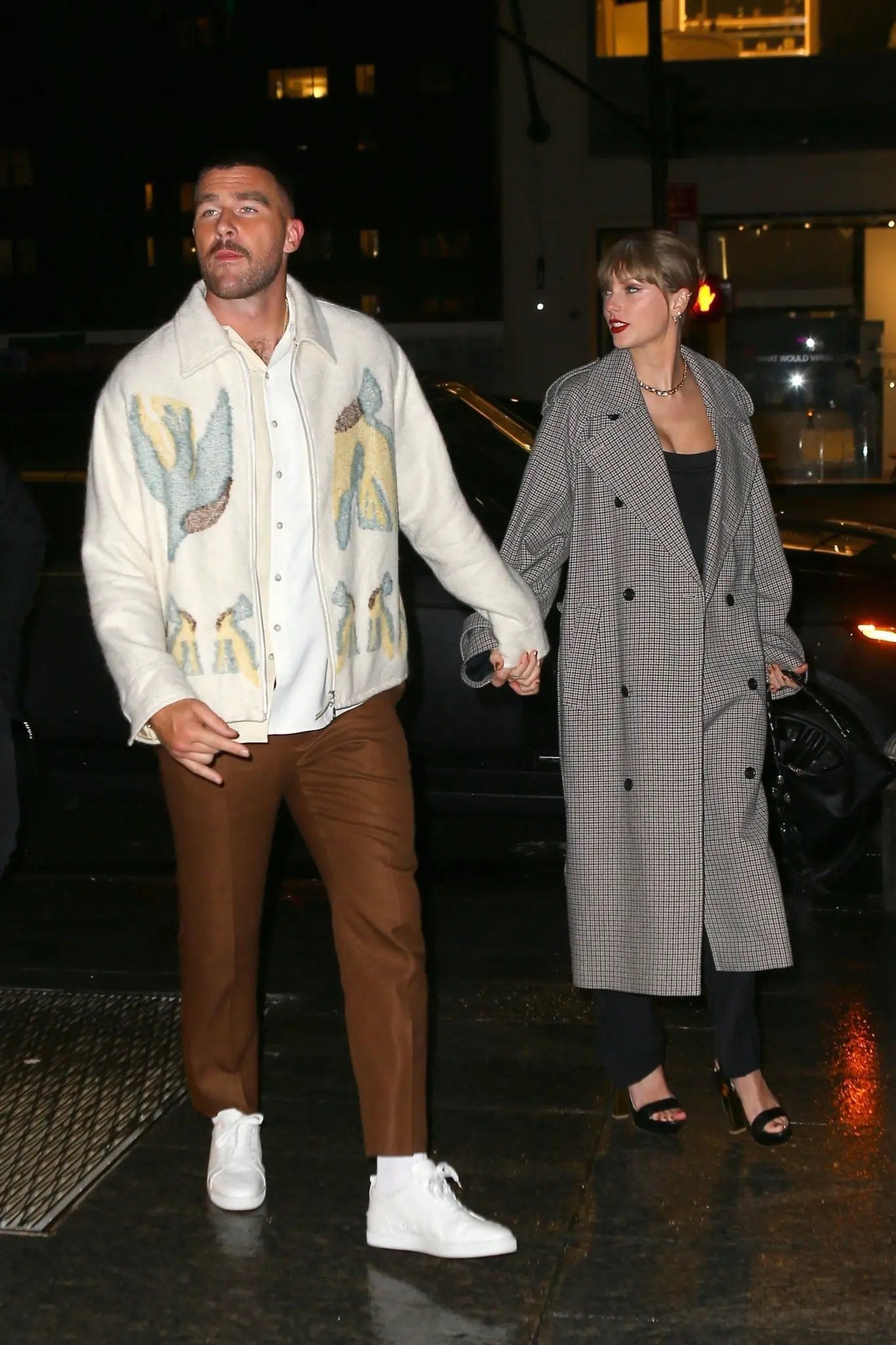 Taylor Swift and Travis Kelce photographed holding hands for the