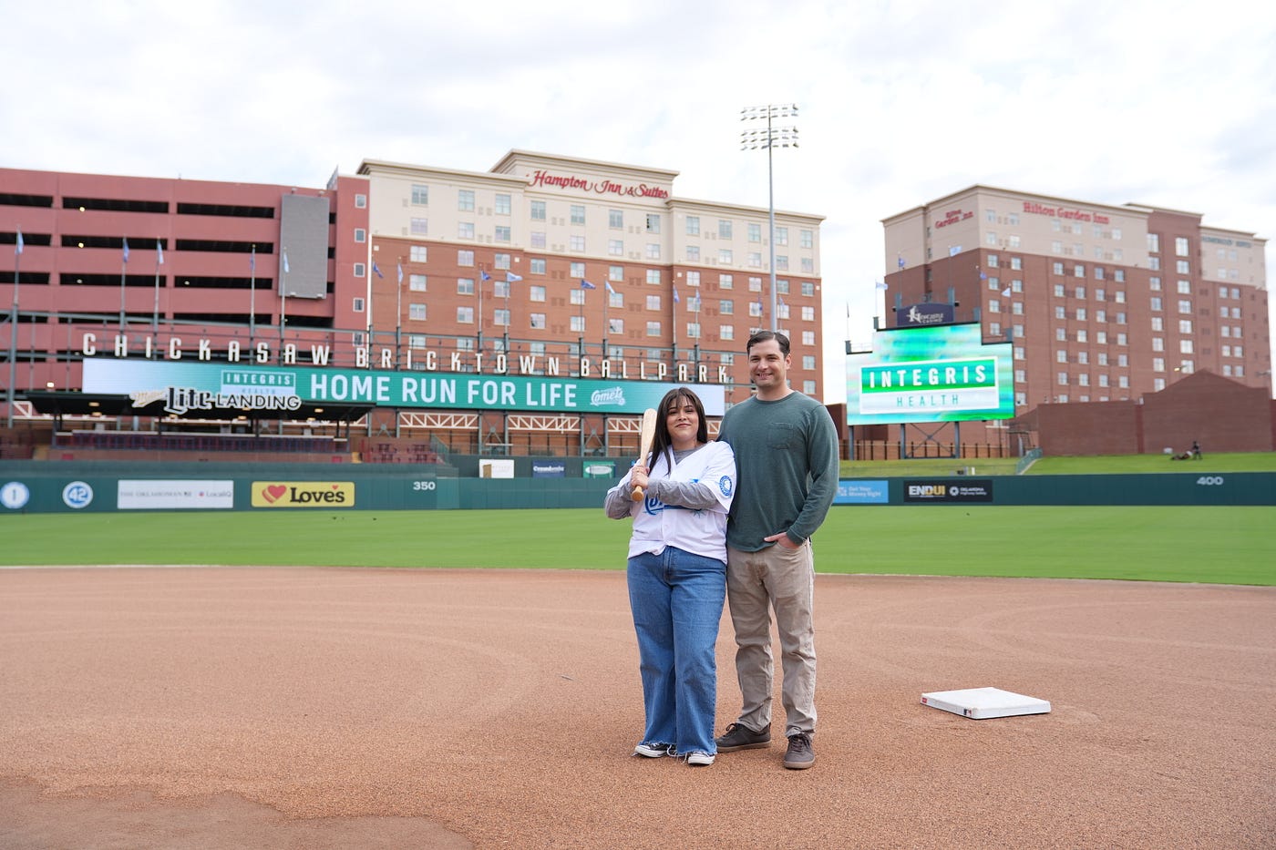 Evilin Juanes-Hamm and her husband Bill recently visited Chickasaw Bricktown Ballpark. Photo courtesy of the OKC Comets.