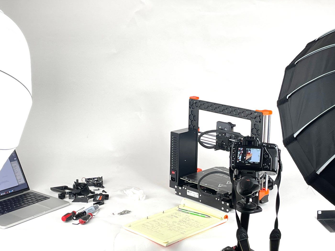 Photostudio with a printer and photoshooting process.