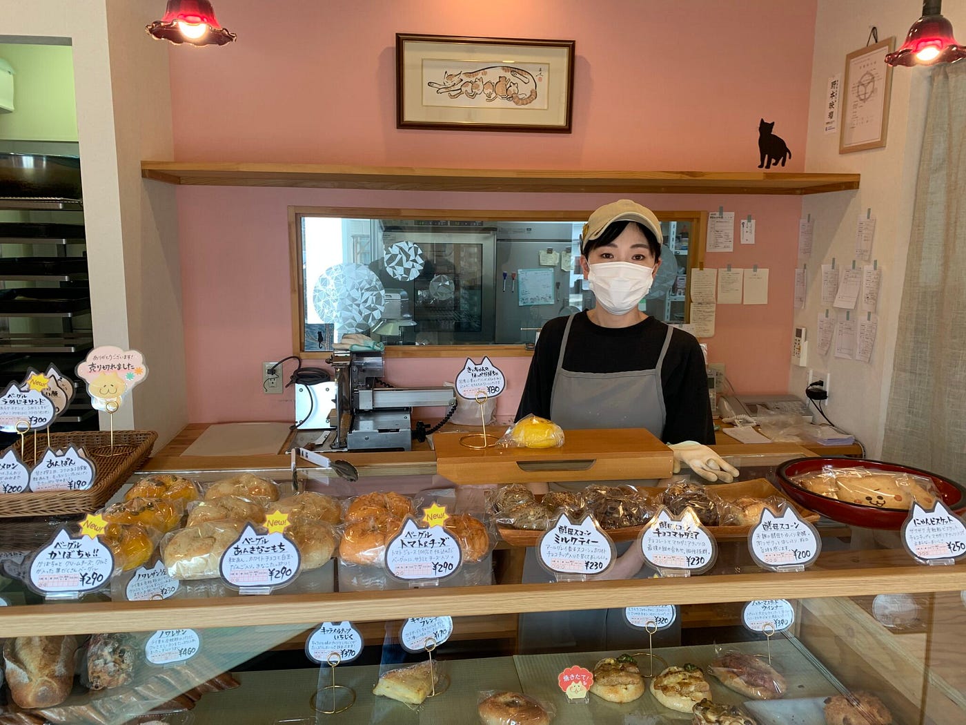 El Nomoto with the cat-shaped bread at Bakeshop Konjoneko. Photo by Takashi Saito.