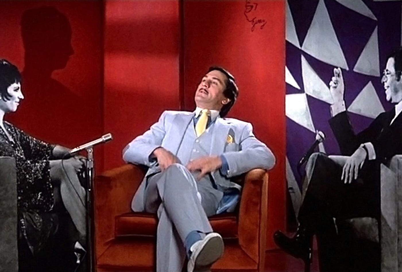 Assim como os delírios de Rupert inspiraram Coringa (2019), a cena acima foi usada diretamente como referência em uma das maiores séries de todos os tempos: Seinfeld (1989–1998) (O Rei da Comédia, 1982)