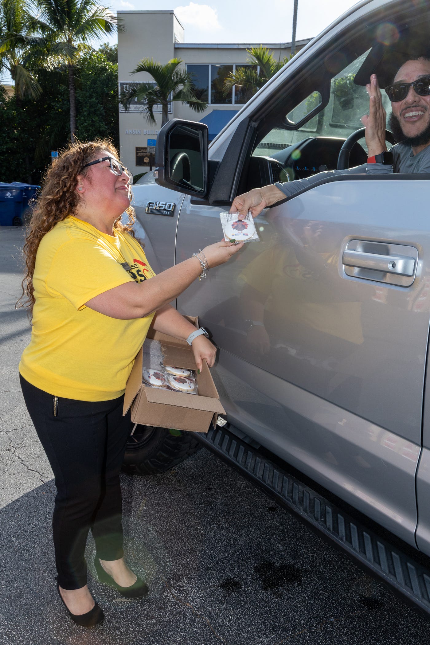 Rick Case Cares volunteer puts a smile on faces_Credit Downtown Photo