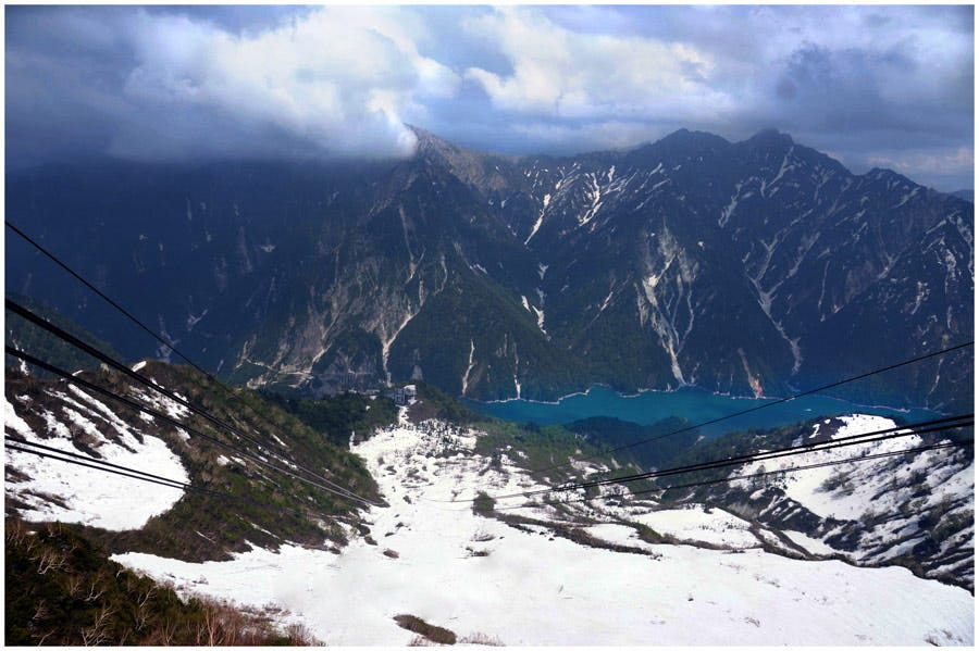 A Walk Through a Snow Corridor at Tateyama-Kurobe | by Altertrips