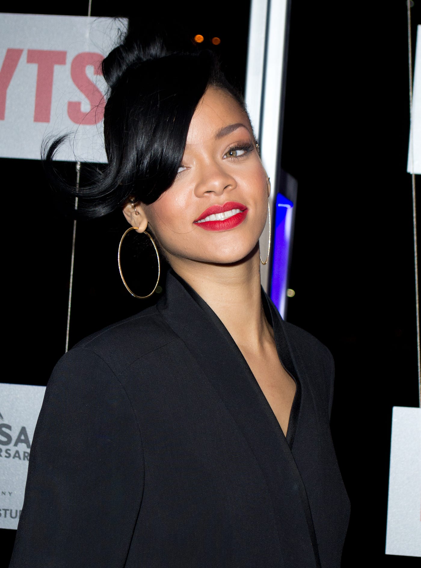 Rihanna wants to cheer up a troubled world with fashion show