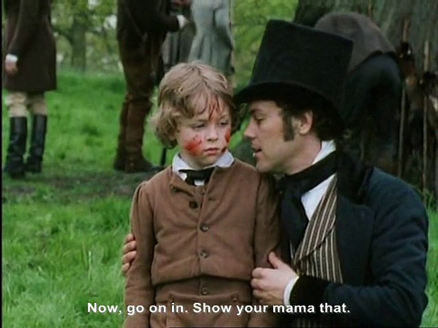 Arthur and his son, smeared in blood