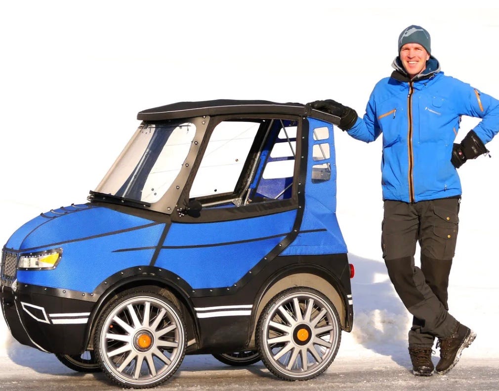 electric enclosed bicycle XPedition Raindrop Blue Cargo Bike | Dual Battery Organic Transit's Enclosed Tricycle Is