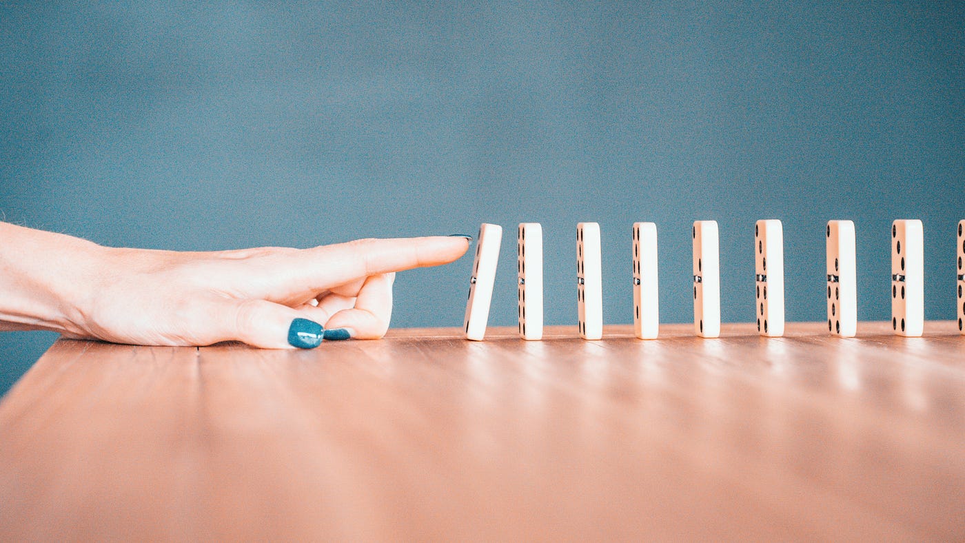 The Domino Effect. When one action can have a huge effect | by Jennifer  Bonn | A Smiling World | Medium