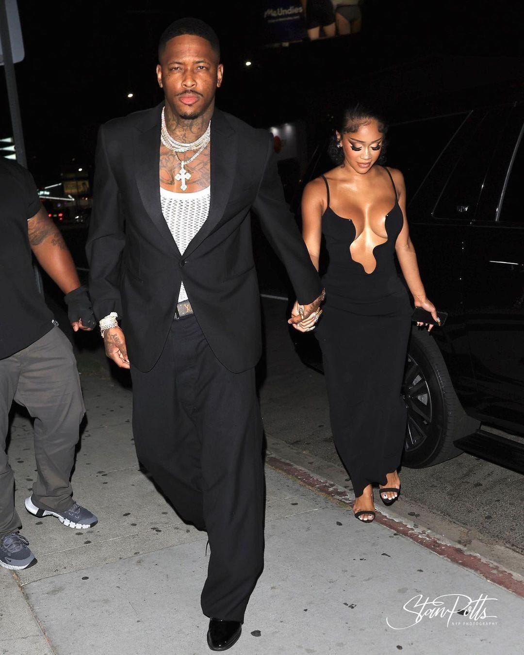 Saweetie's Black Plunging Christopher Esber Dress With YG