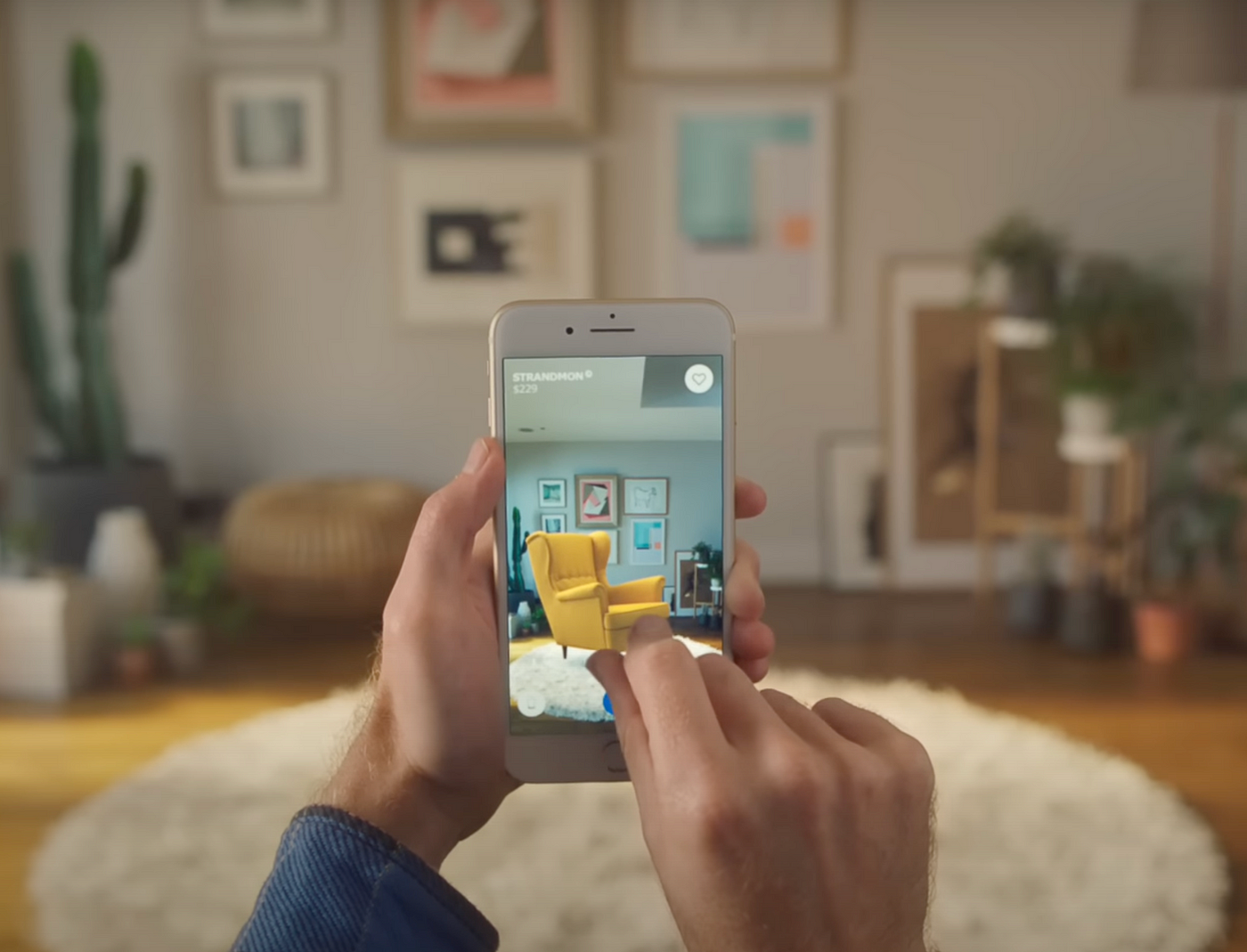 AR armchair in a living room with a hand pinching the chair