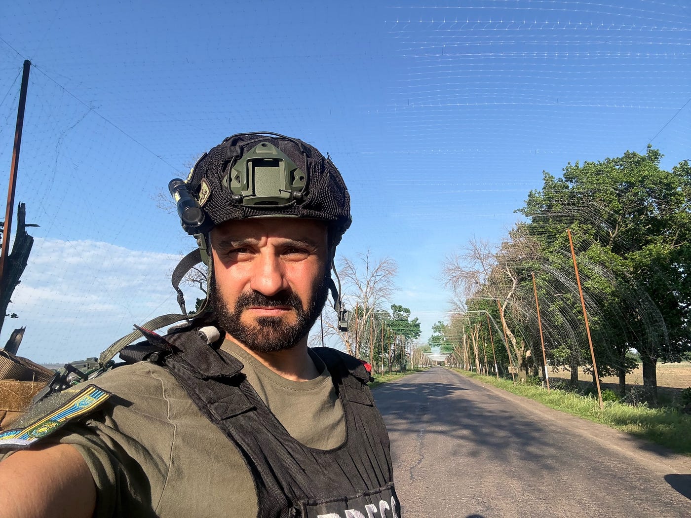 me reporting from the anti-drones corridors in Ukraine’s Donbas a couple of days before writing this article – copyrighted photo Giorgio Provinciali