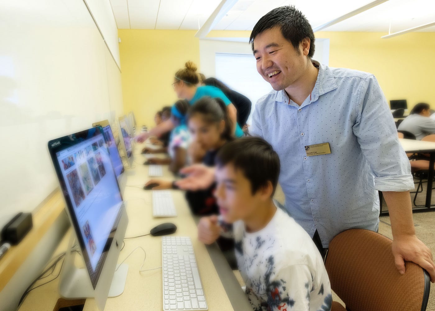 Professor Renzhi Cao teaches computer science to local middle school students at Pacific Lutheran University. Early engagement is a regular feature of Computer Education Week and growing technical communities. (Photo: John Froschauer / Pacific Lutheran University)