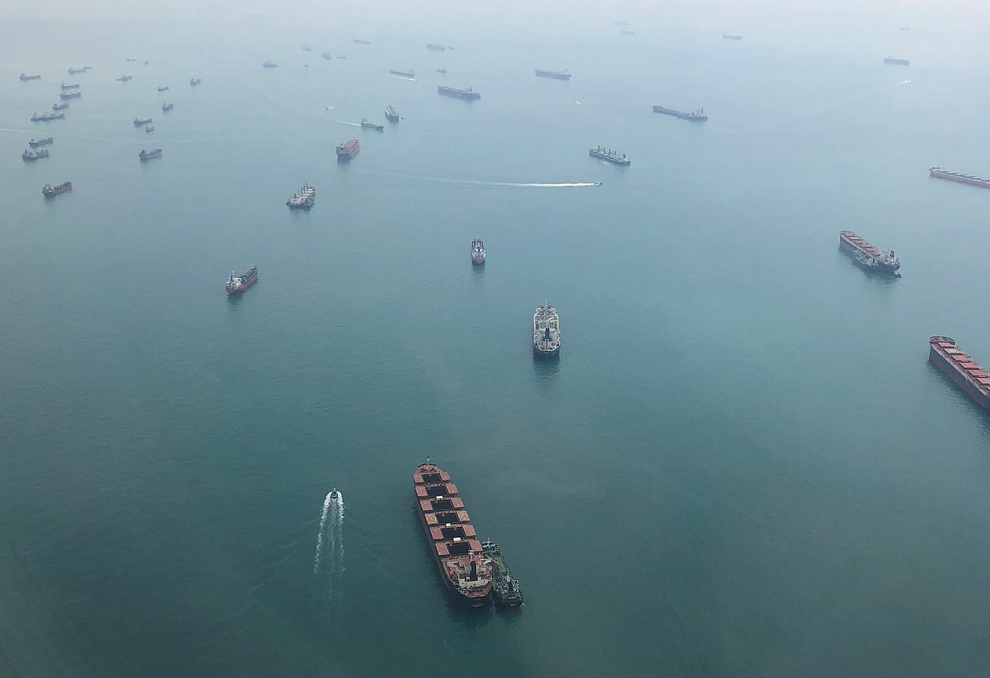 Ships in the Singapore Strait. Credit: By Bjoertvedt — Own work, CC BY-SA 4.0