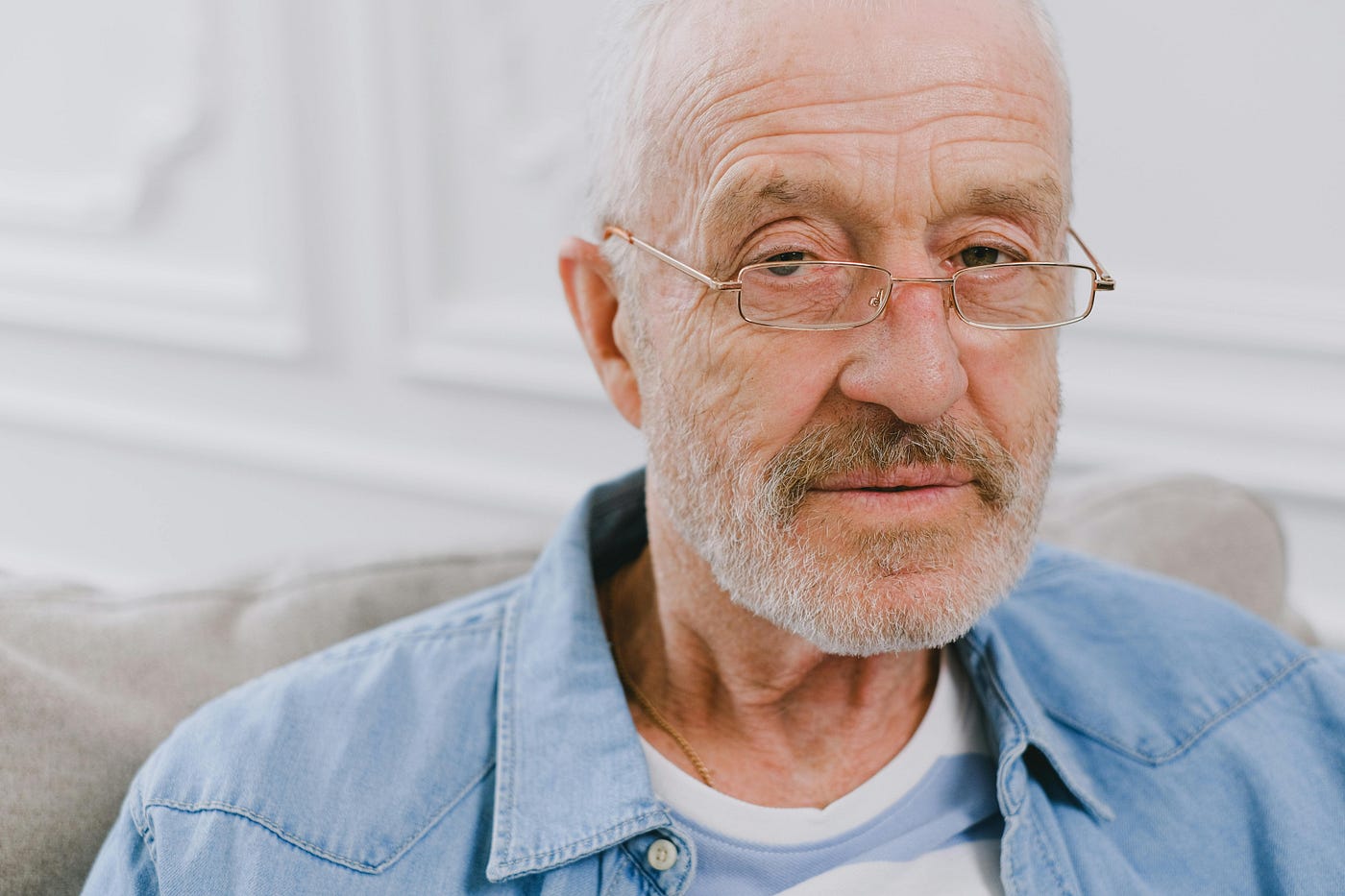 A close-up of an older man, likely around my dad’s age. Photo by SHVETS production from Pexels.