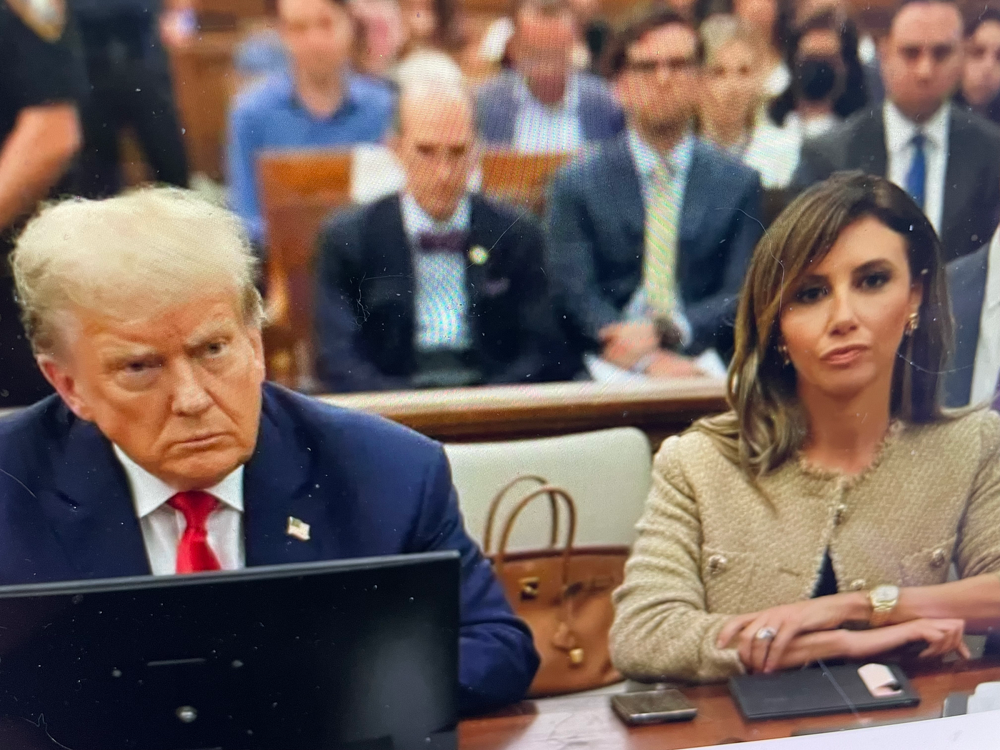 The Beautiful Woman Next to Trump