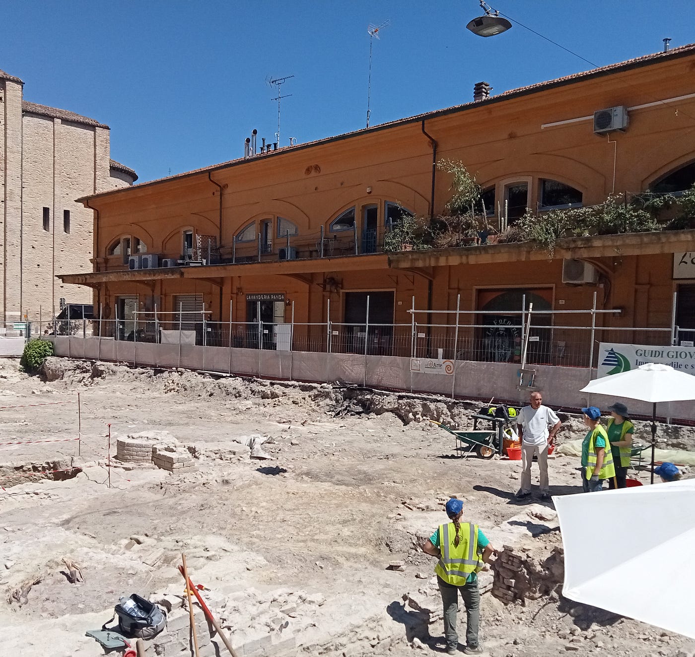 Archaeologists continue the work of uncovering the remains of the Basilica of Vitruvius in Fano’s centro storico. The stump of one of the iconic building’s massive columns and its pilaster can be seen on the left.