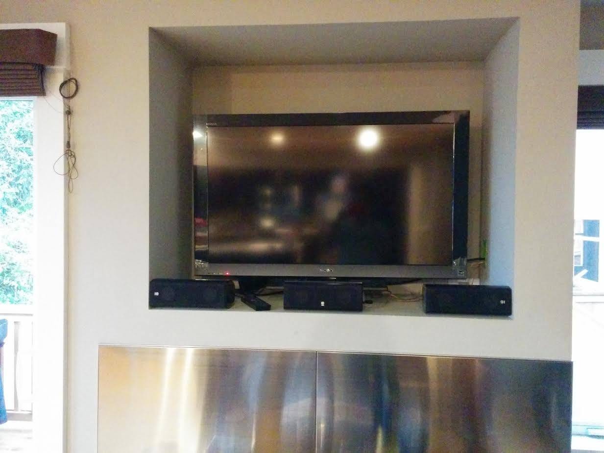 Big TV in an over fireplace nook. Our home had a little TV nook over the… |  by Alex Schokking | Medium