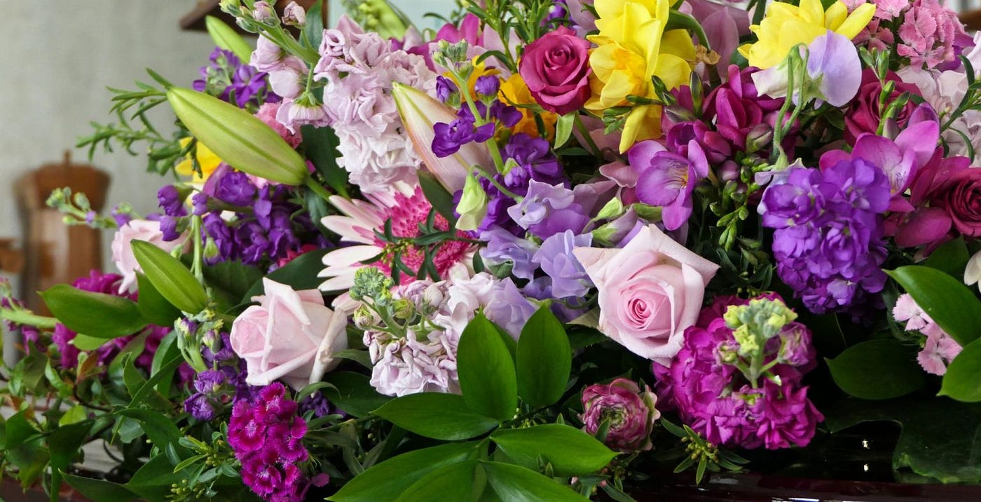 How to Choose Funeral Flowers & What They Mean