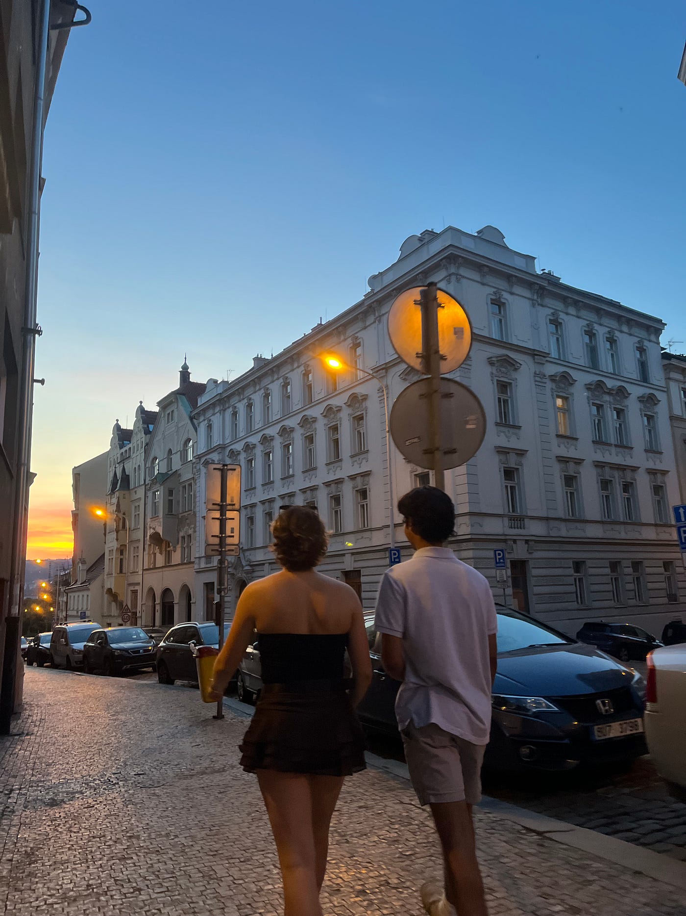 Walking from the fortress as the sun sets.