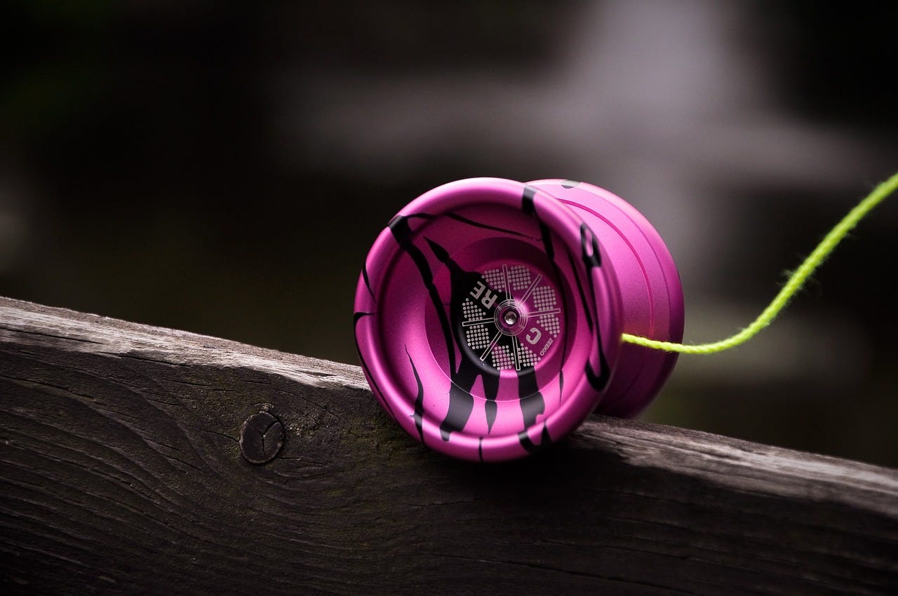 The Enduring Charm of Yo-Yos: From Ancient Origins to Modern Marvels | by  Ron Thomson | Medium