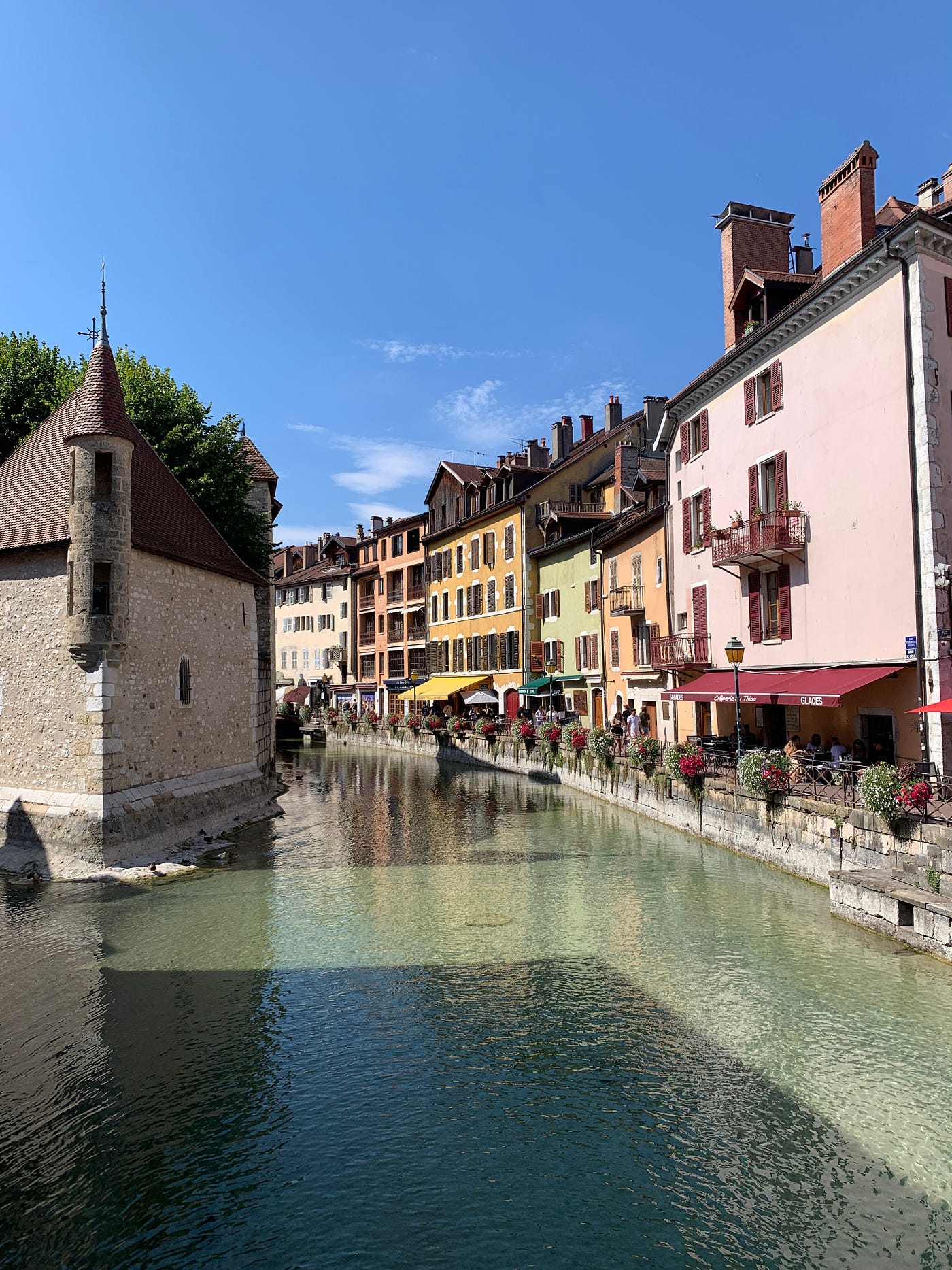 L: Ponte Vecchio in Florence, Italy; R: Palais de l’Île in Annecy, France — Karon M. G. Murray