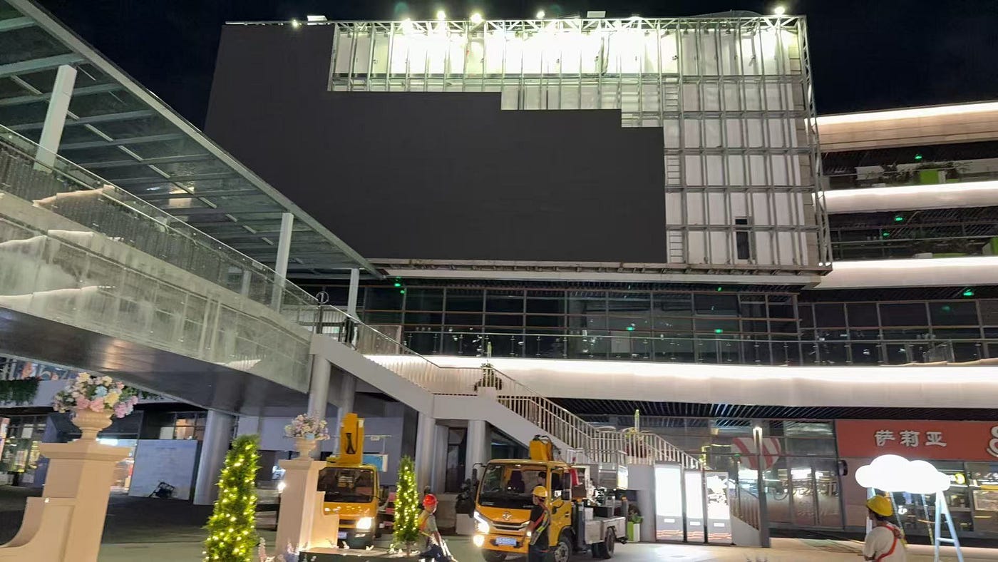 Commercial building wall LED billboard installation