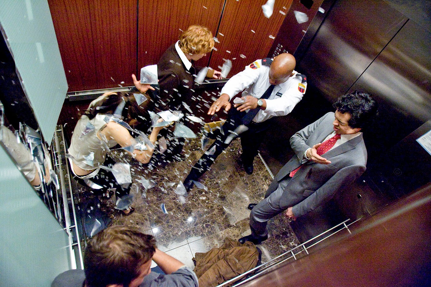 film still from inside the elevator of single-location horror: Devil (2010)