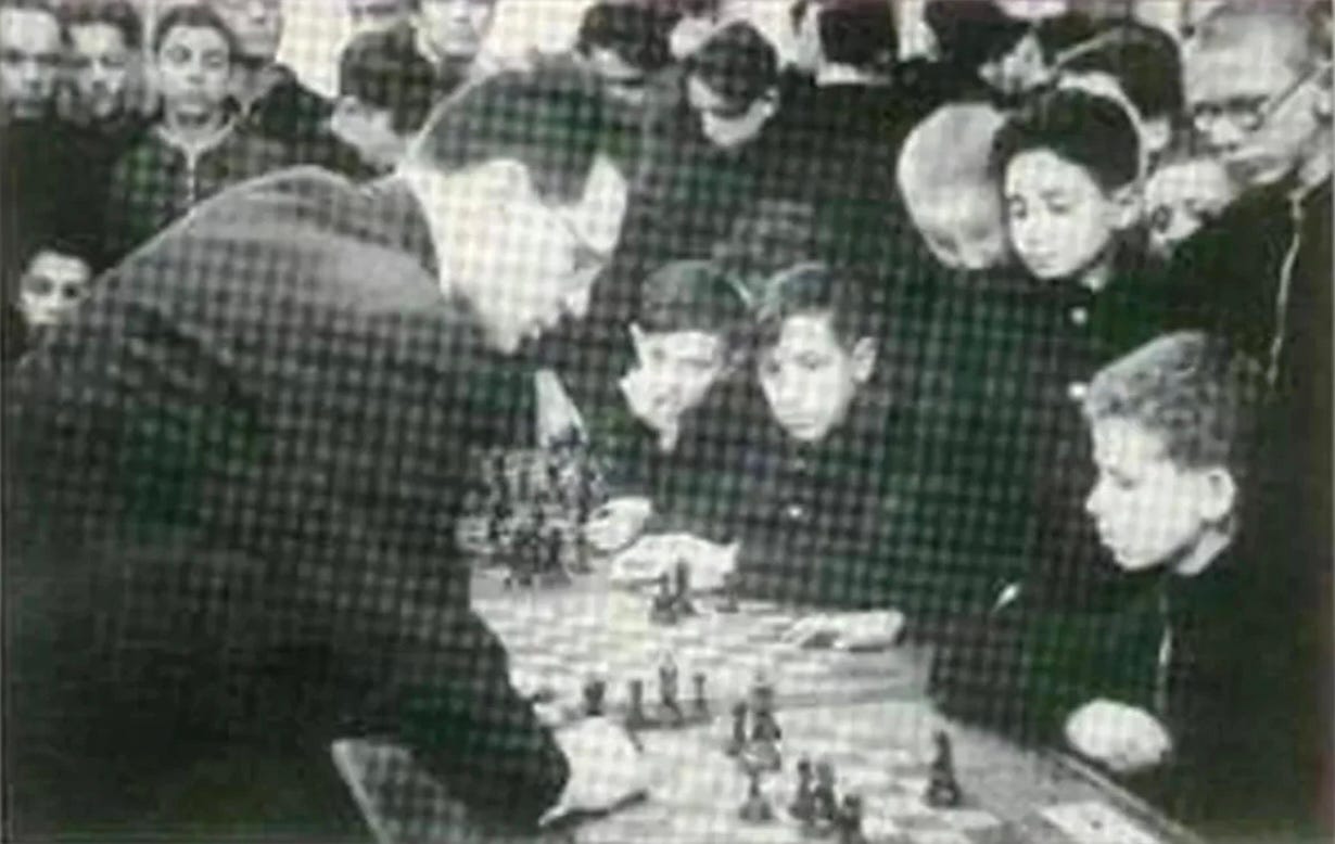 Boris Spassky, left and Bobby Fischer analyze their match in Sveti