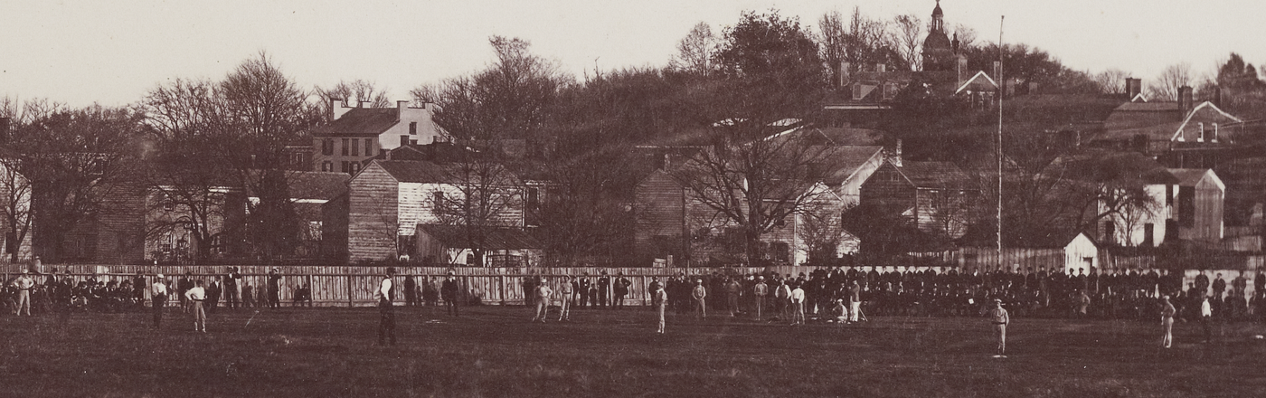 This is a cropped extract from a larger photograph of the Philadelphia Athletics playing ball with the Princeton College nine on October 31, 1868. The Athletics, who were 47–3 on the year, lost this last game of their season, 25–17, a shocking upset that may have thrown their presumed championship (unofficial at that time before league play) into dispute.