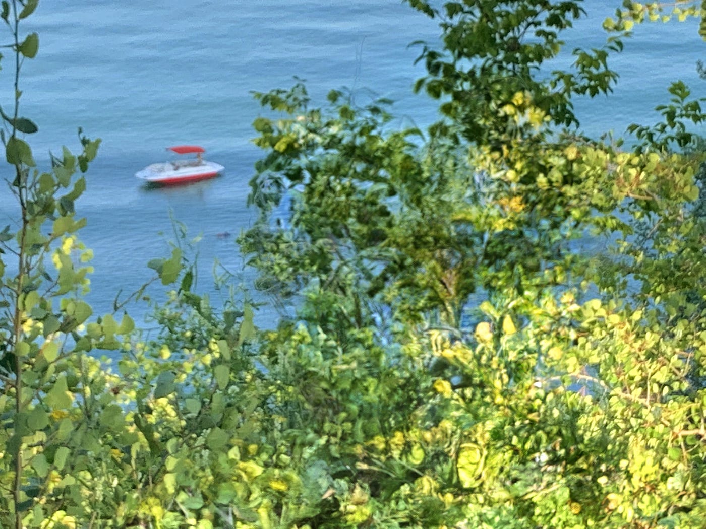 Small boat, enormous lake. Photo by Author