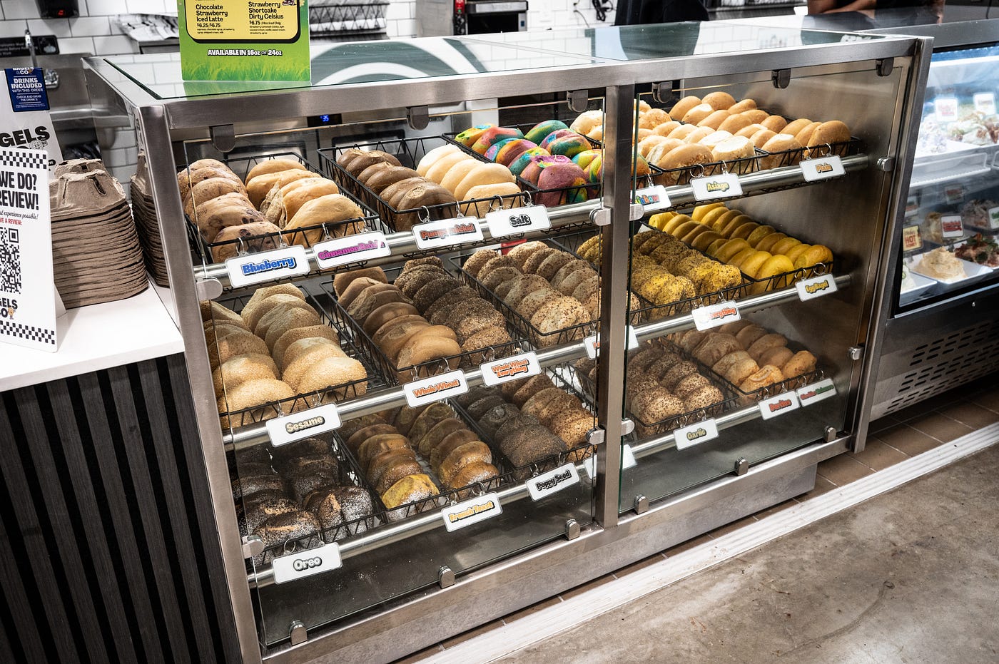 Bagels & Co. bakes more than a dozen varieties of Brooklyn-style bagels daily including poppy seed, everything, sesame, egg, whole wheat, blueberry, rainbow, garlic and Oreo. (Credit: Michael Murphy)