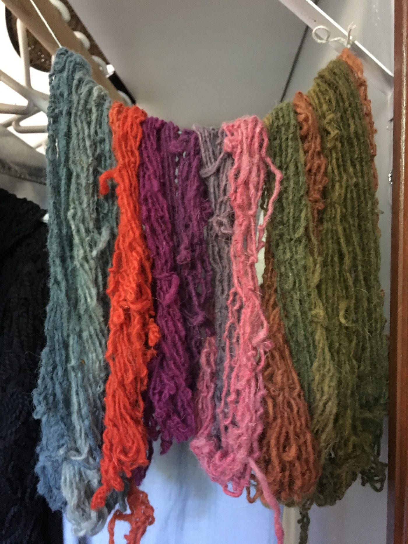 Dye samples from the natural dye workshop I taught a couple weeks ago. On  the left: Coffee beans on wool yarn, linen, si…
