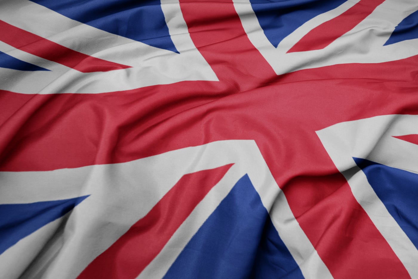 “ waving colorful national flag of great britain. macro shot “ | by Eesfera | Shutterstock