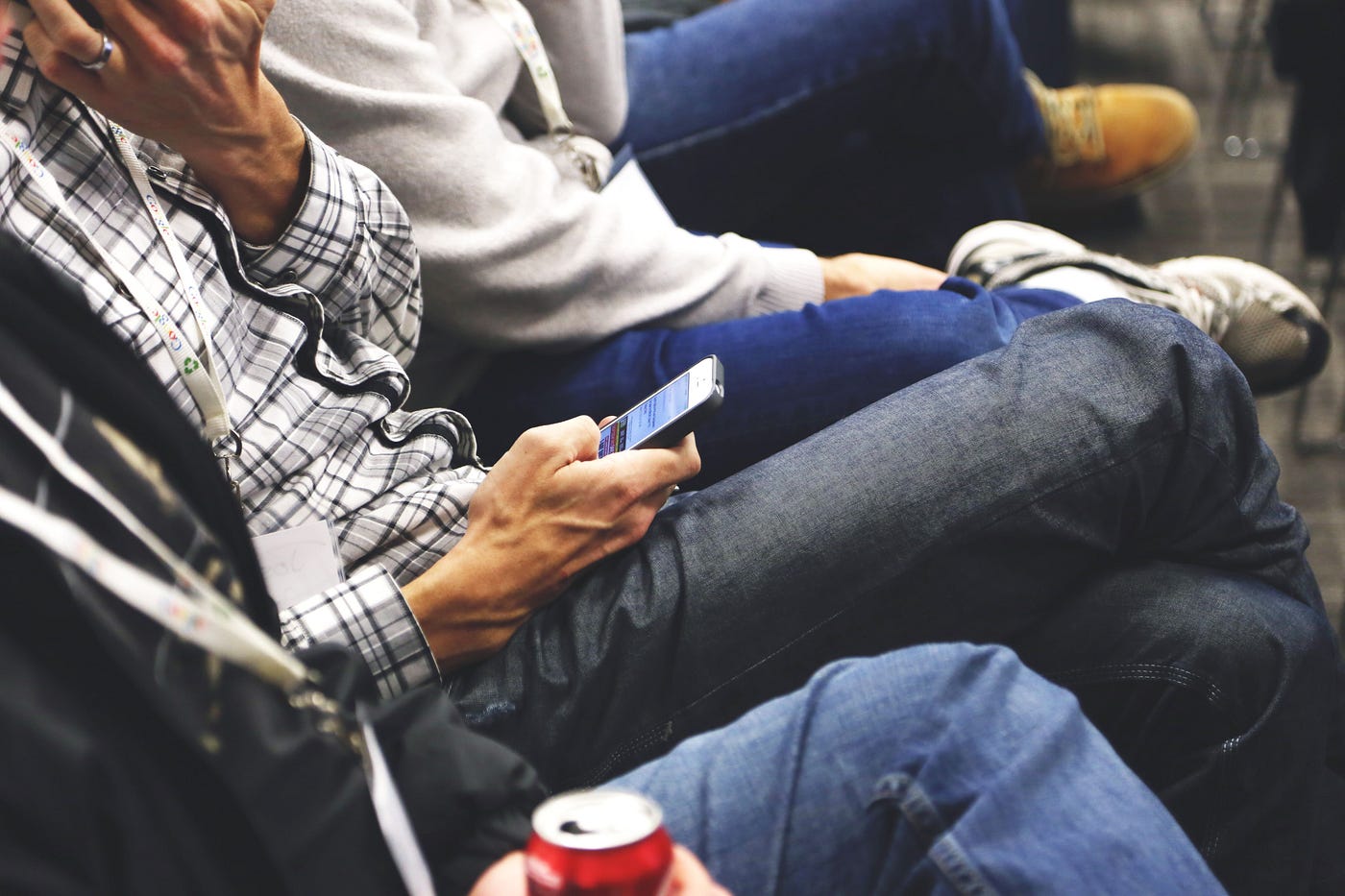 https://www.pexels.com/photo/three-person-sitting-on-chairs-while-crossed-legs-7115/